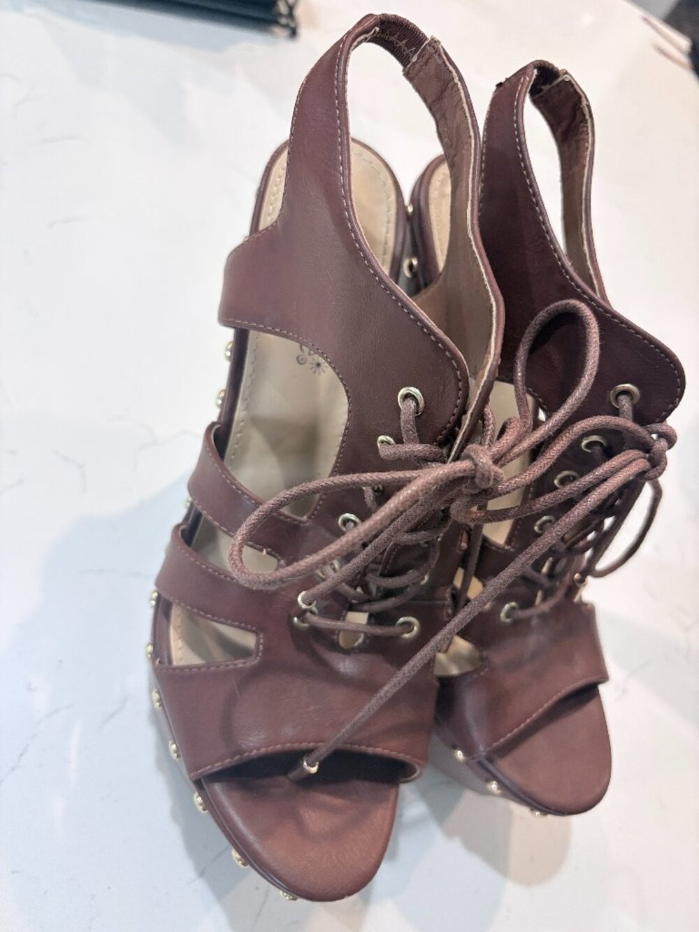 Brown studded wedge heels